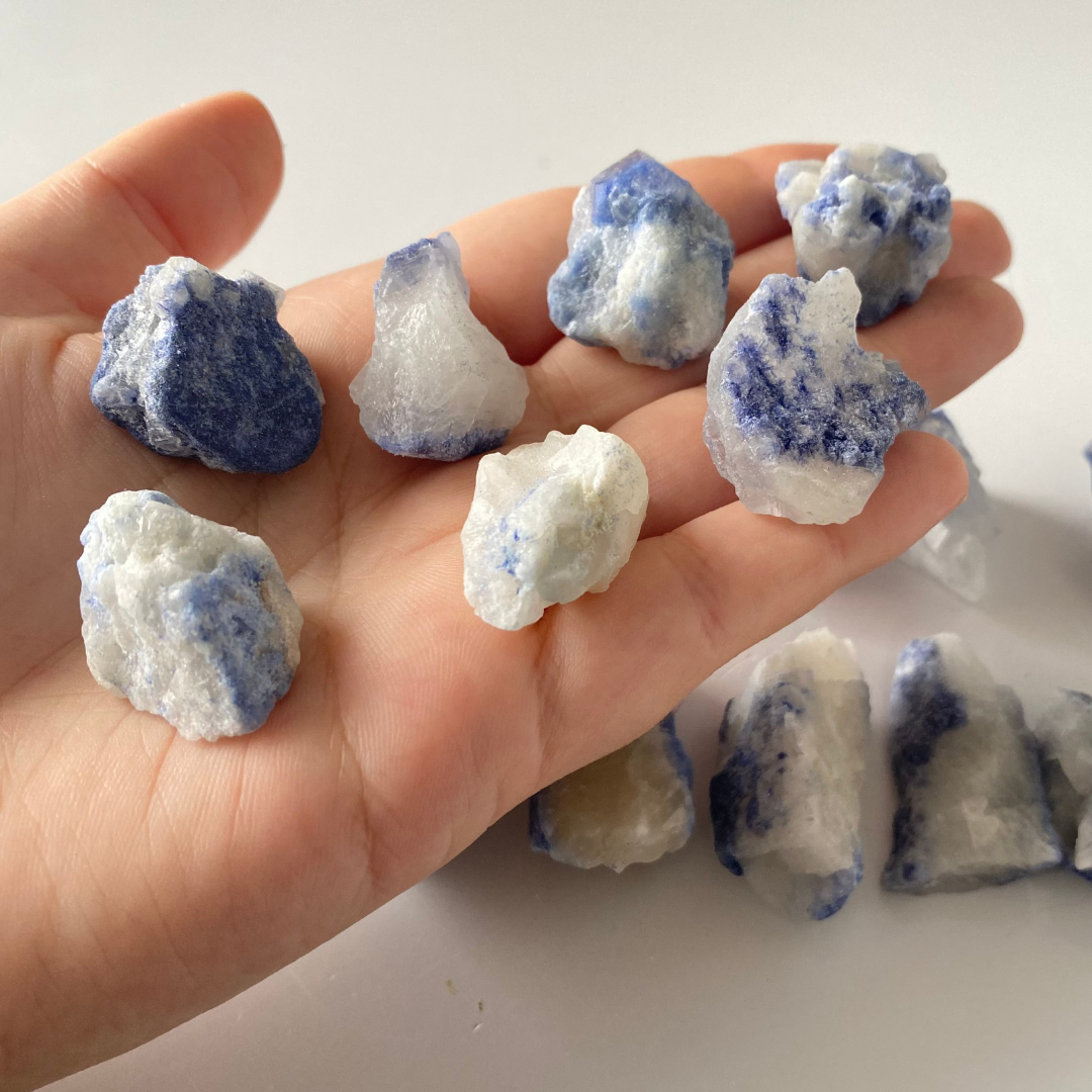 Opaque, saturated deep blue Dumortierite. Sub-vitreous, sub-opaque to opaque, white Quartz. Dumortierite has developed on the surface of the Quartz. Rough Chunks of Dumortierite on Quartz, these pieces do not have a crystallised shape.