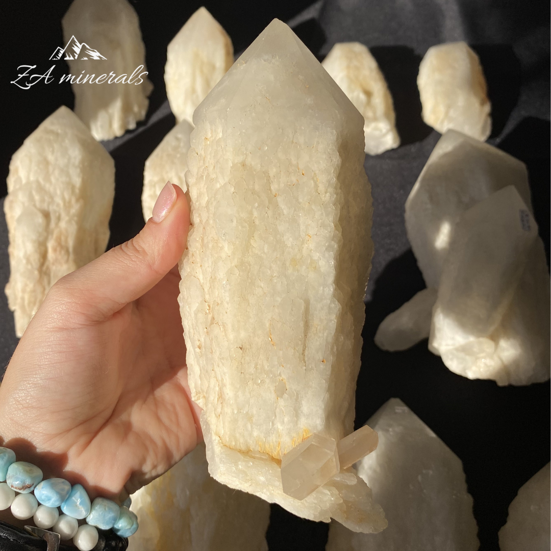 White Quartz crystal in hand for size reference White Quartz crystal in hand for size reference 