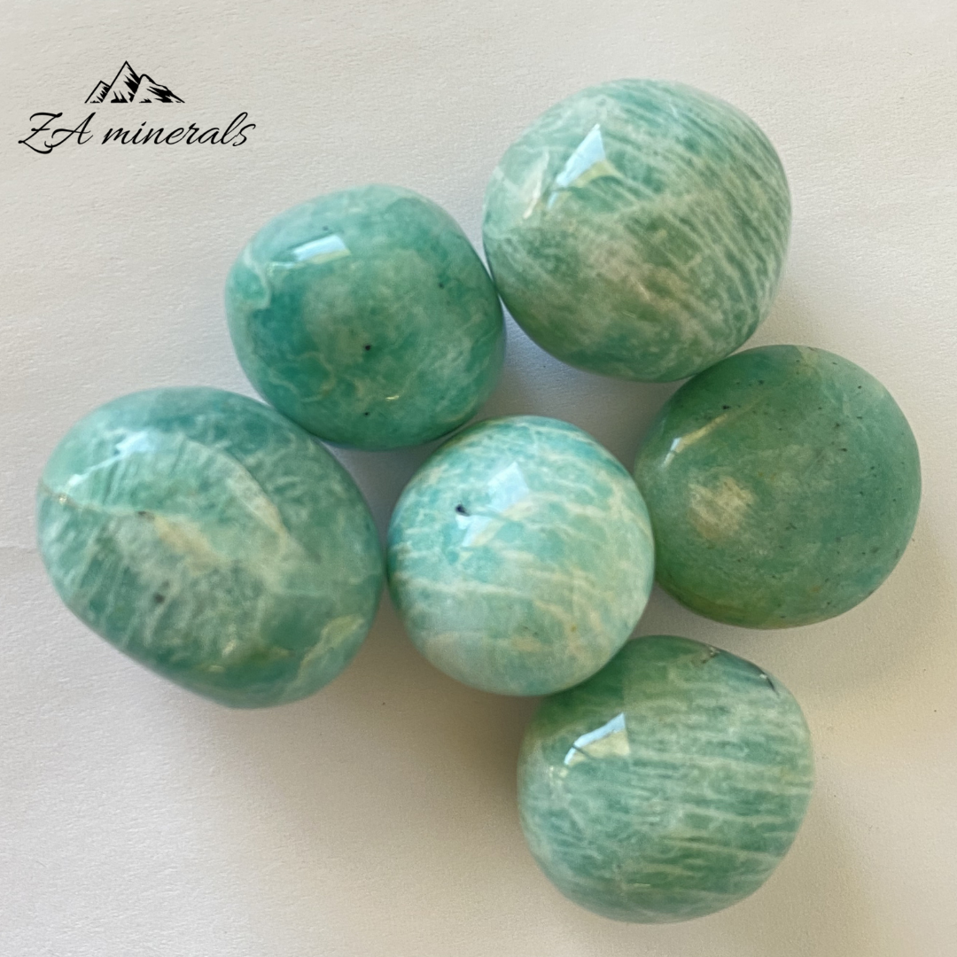 Green to blue toned Amazonite gumballs from Madagascar. 