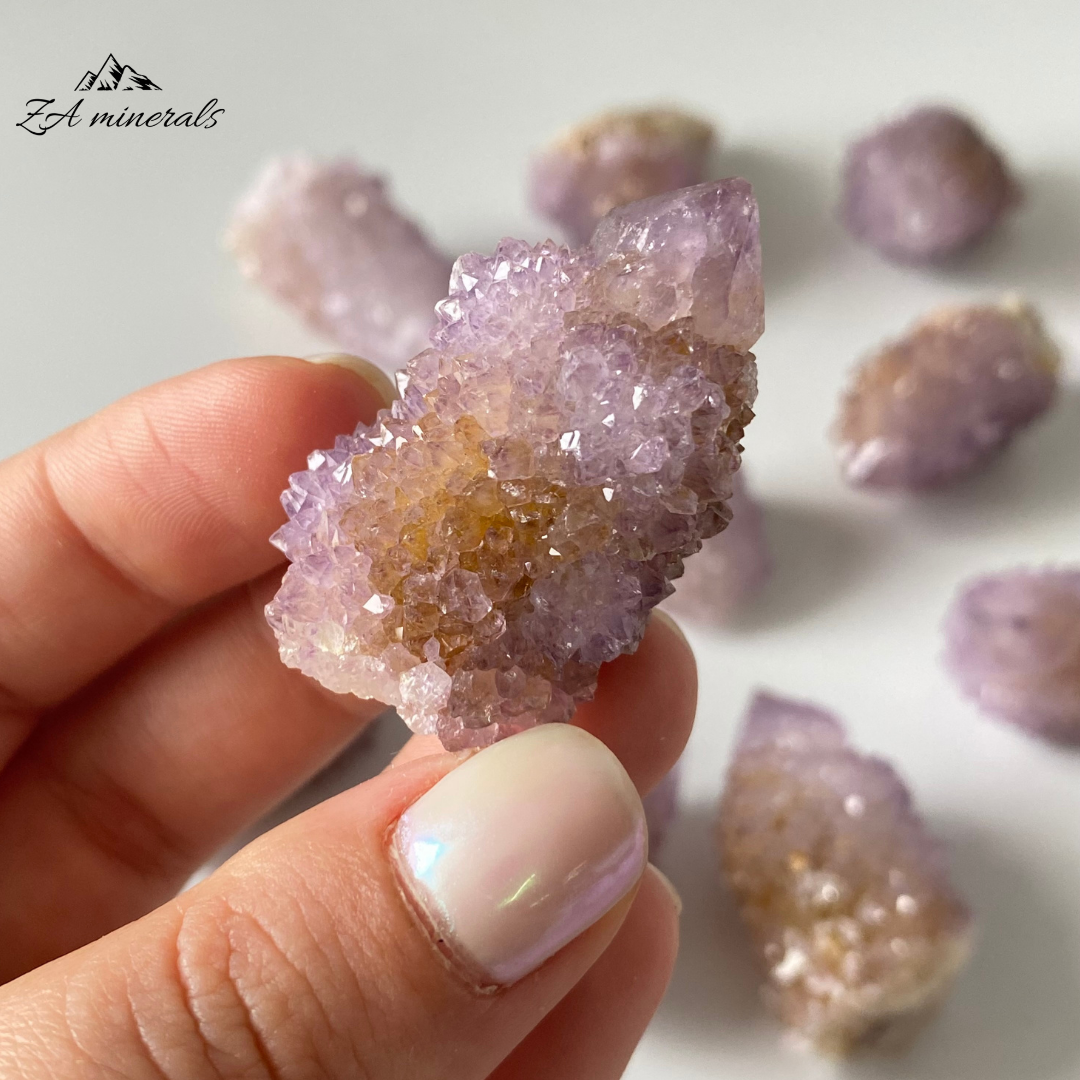 Prismatic Quartz terminations cover the first generation Quartz surface. Vibrant Lavender-purple colour of the Quartz. Lavender-purple zoning can be seen in the crystal terminations. Minor yellow iron staining&nbsp; Scattered chips and damage to the base and perimeter of the crystals.