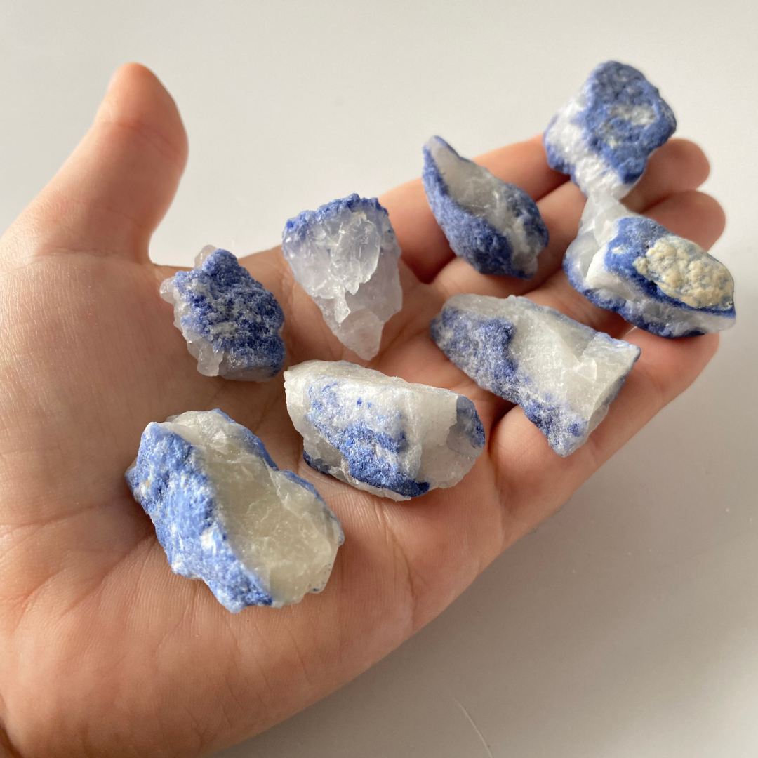 Opaque, saturated deep blue Dumortierite. Sub-vitreous, sub-opaque to opaque, white Quartz. Dumortierite has developed on the surface of the Quartz. Rough Chunks of Dumortierite on Quartz, these pieces do not have a crystallised shape.