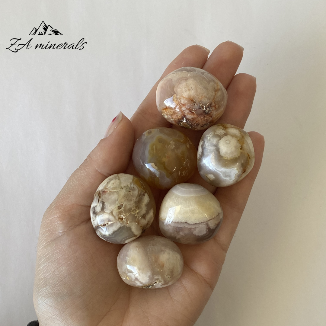Size reference of the Flower Agate gumballs in hand